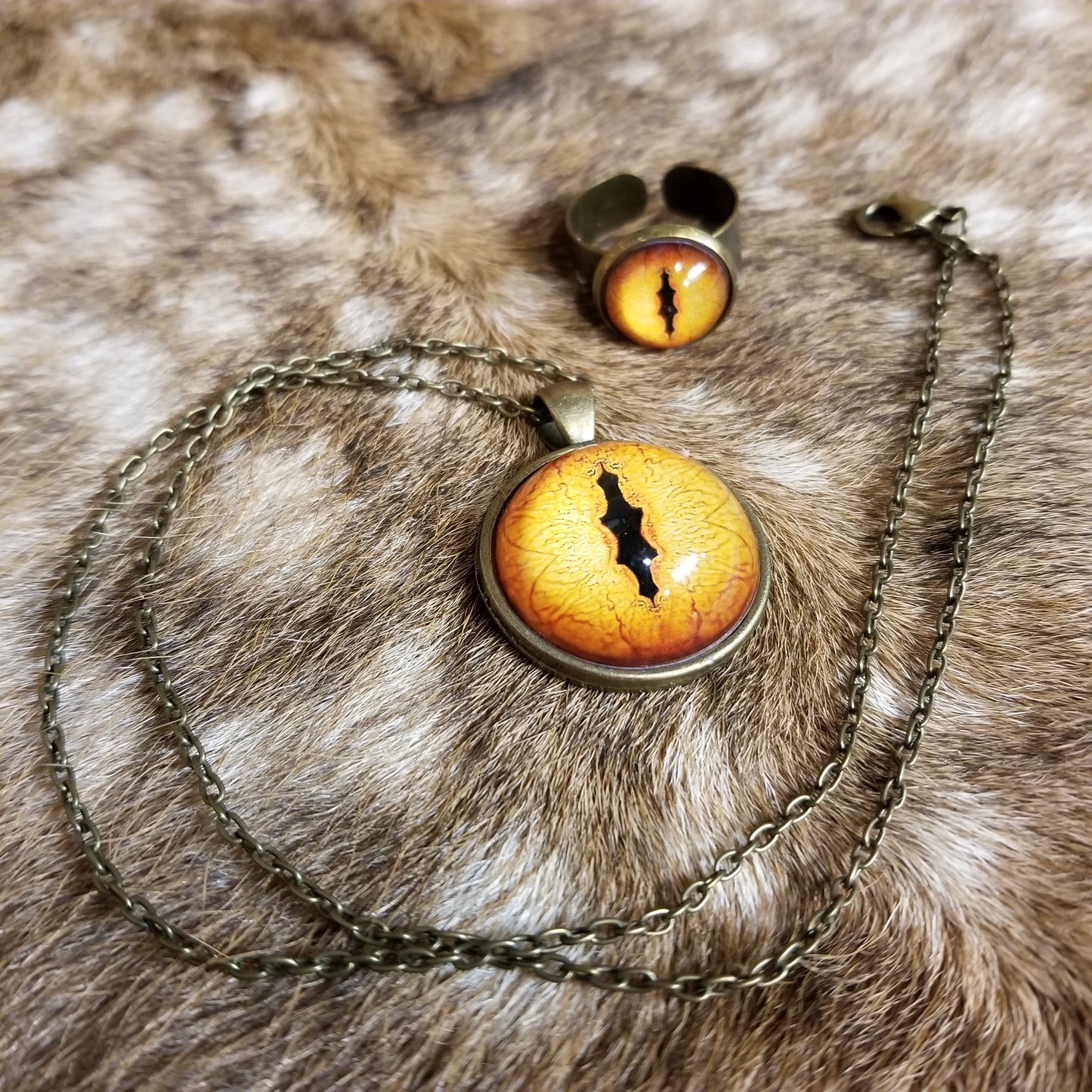 Duo of pendant & adjustable ring with taxidermy eye